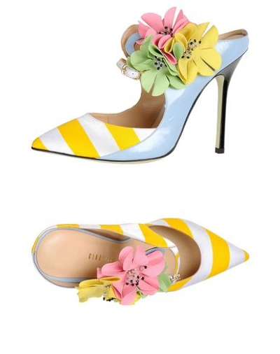Shop Giannico Mules In Yellow