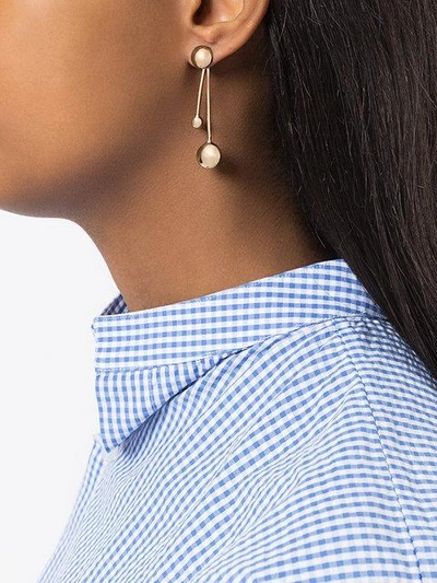 Shop Pamela Love Satellite Earrings In Metallic