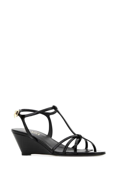 Prada T-strap Leather Wedge Sandal In Black