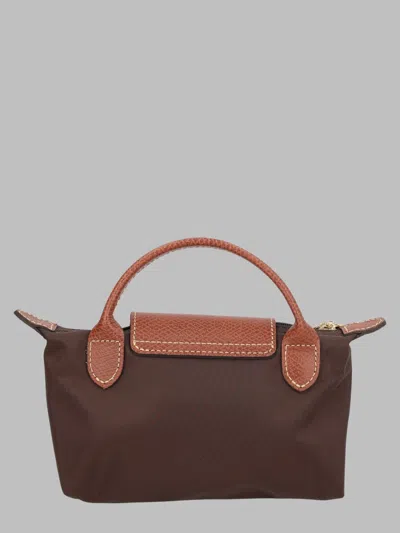 Longchamp Clutch In Brown