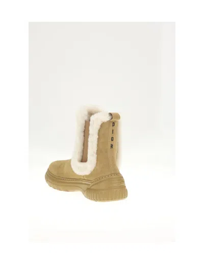 Dior Shearling-lined Calf Leather Boot In Brown