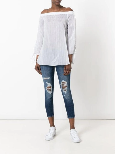 Shop J Brand Distressed Skinny Jeans In Blue