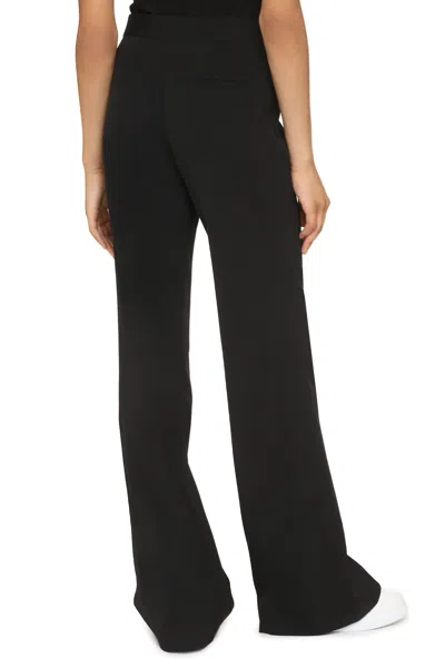 Stella Mccartney Wool Flared Trousers In Black