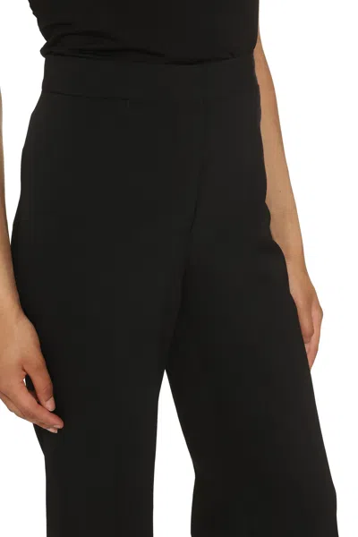 Stella Mccartney Wool Flared Trousers In Black
