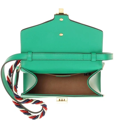 Shop Gucci Sylvie Mini Leather Crossbody Bag In Sye. G. Gar.
