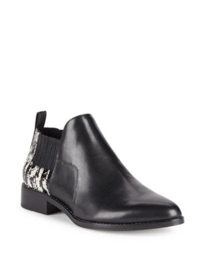 Pour La Victoire Almond Toe Leather Chukka Boots In Black