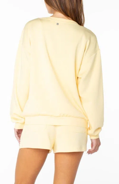Roxy Surfing By Moonlight Embroidered Graphic Sweatshirt In Yellow