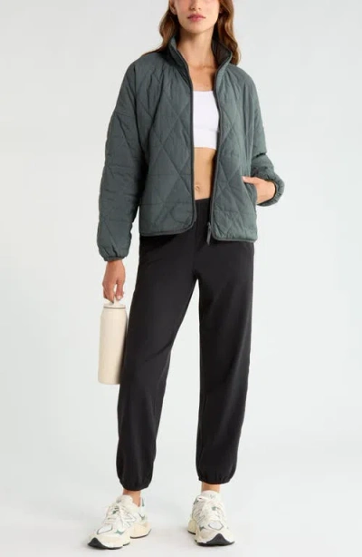 Zella Compass Quilted Packable Jacket In Green