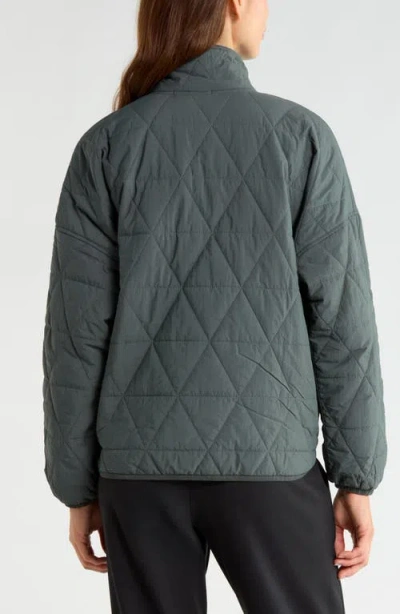 Zella Compass Quilted Packable Jacket In Green