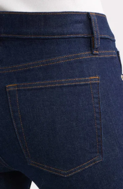 Frame The Pixie Low Rise Bootcut Jeans In Orange