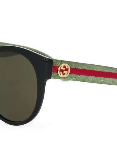 Shop Gucci Web Arm Round Sunglasses In Green
