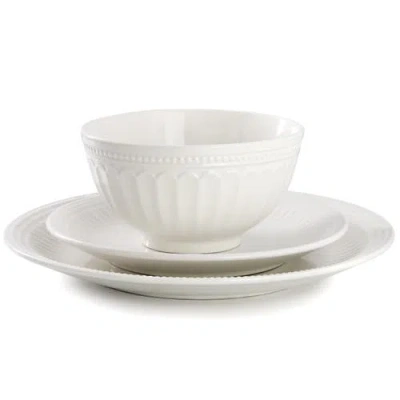 Elama 12 Piece Stoneware Dinnerware Set In White