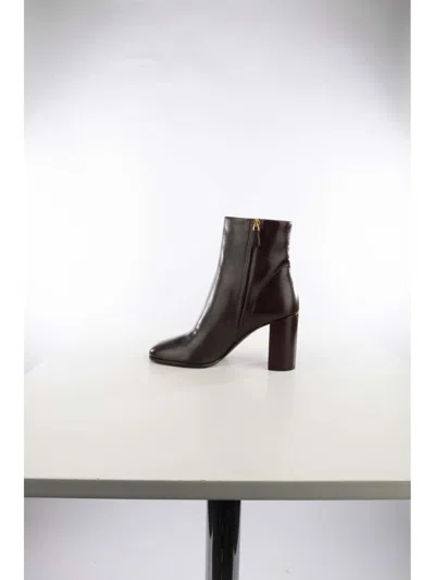 Prada Leather Booties In Brown