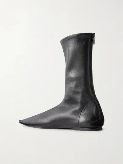 Khaite Solid Leather Ankle Boots In Black