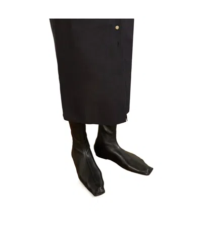Khaite Solid Leather Ankle Boots In Black
