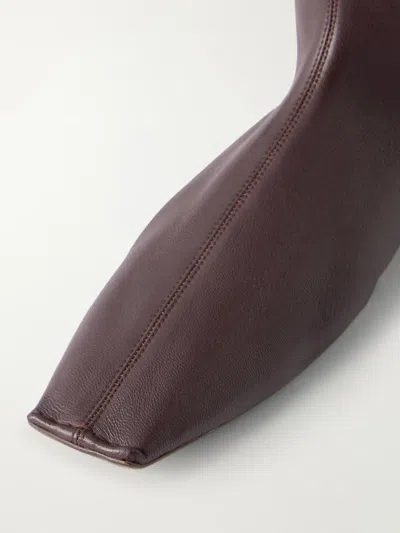 Khaite Solid Leather Ankle Boots In Black