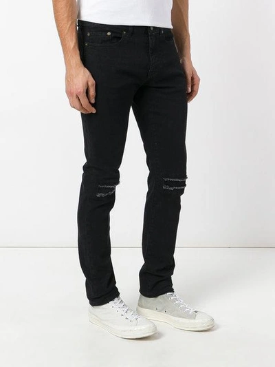 Shop Saint Laurent Low Waisted Skinny Jeans - Black