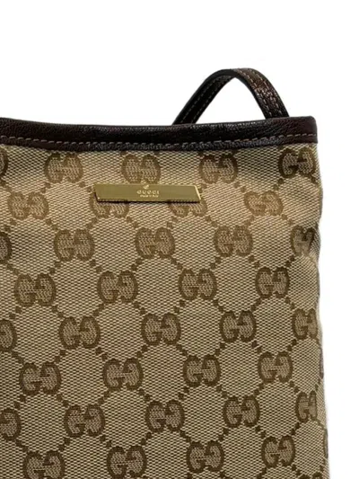 Gucci Gg Supreme Phone Pouch In Brown