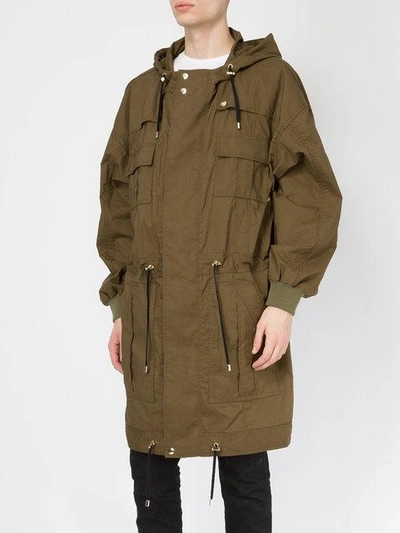 Shop Balmain Flap Pocket Parka Coat In Green