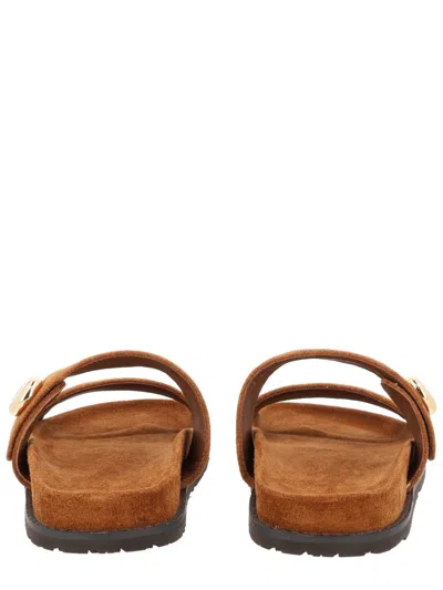 Tory Burch Romy Brown Sandals With Logo Plaque On The Front In Suede Woman In Brown
