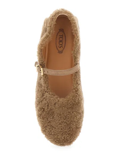 Tod's Buckle-strap Shearling Ballet Flats In Brown