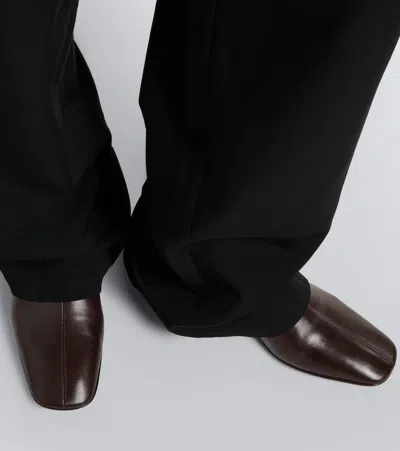 The Row Solid Color Leather Ankle Boots In Brown