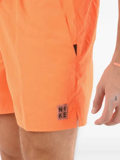Nike Logo-patch Elasticated Swim Shorts In Orange