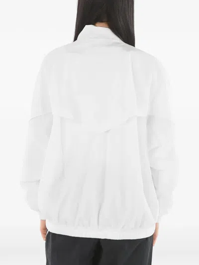 Nike Logo Embroidered Solid Color Windbreaker Jacket In White