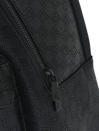 Jordan Monogram-pattern Backpack In Orange