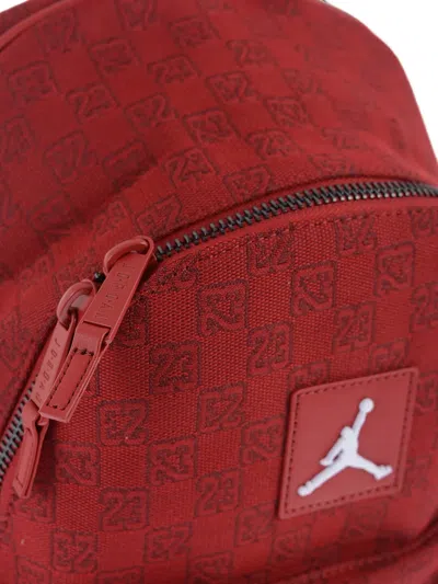 Jordan Monogram-print Backpack In Purple