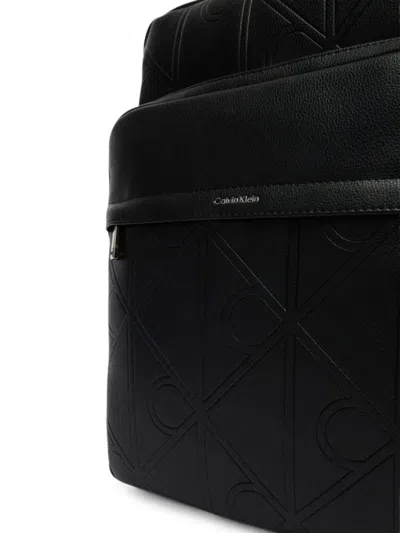 Calvin Klein Monogram-embossed Pebbled-leather Backpack In Black