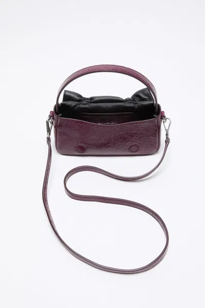 Acne Studios Multipocket Micro Bag In Berry Powder