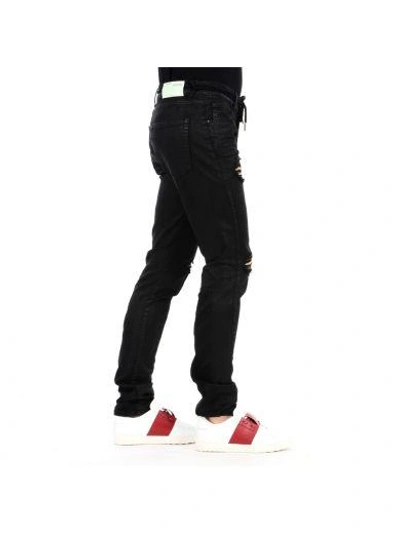 Shop Off-white Black Diagonal Spray Denim Pants