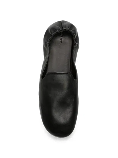 The Row Casa Elasticated Leather Slippers In Black