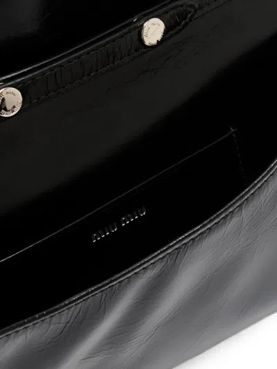 Miu Miu Leather Pouch With Shoulder Strap In Blue