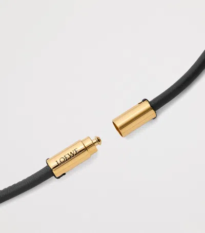 Loewe Leather Pebble Phone Strap In Black