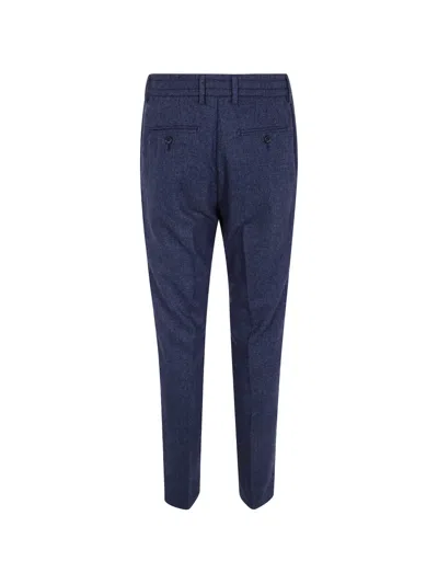Cruna Herringbone-pattern Wool Trousers In Blue