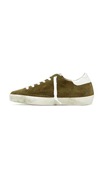 Shop Golden Goose Superstar Sneakers In Olive Green/white Star