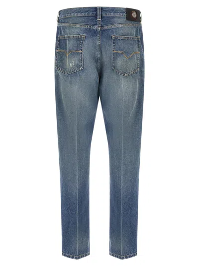 Versace Stone-washed Distressed Jeans In Blue