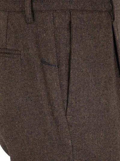Cruna Herringbone-pattern Trousers In Brown