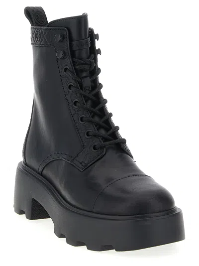Tory Burch Monogram-embossed Lug Sole Ankle Boot In Pink