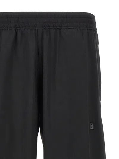 Givenchy Logo-embroidered Wool Joggers In Black