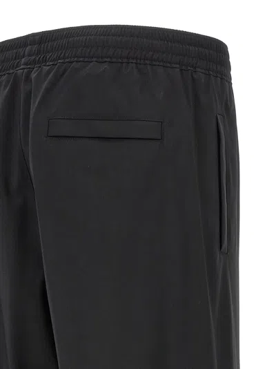Givenchy Logo-embroidered Wool Joggers In Black