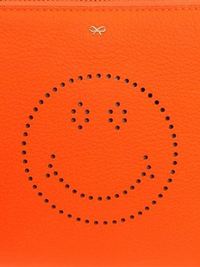 Shop Anya Hindmarch Neon Orange Clutch With Smile
