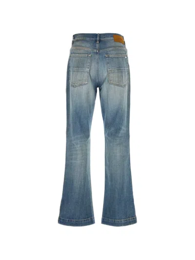 Amiri Distressed Flared Jeans In Blue