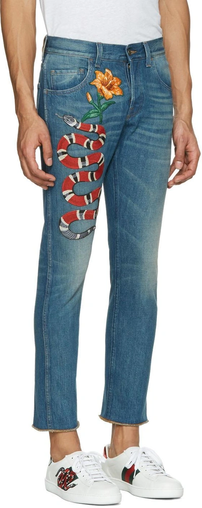 Gucci Snake Embroidered Slim-fit Jeans In Stonewashed-blue | ModeSens