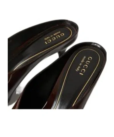Gucci Solid Color Heeled Mules In Black