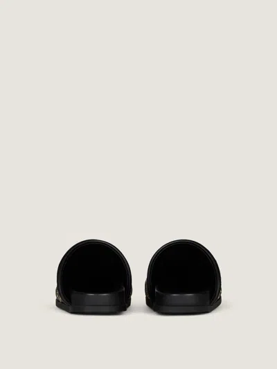 Givenchy Label Flat Mules In Leather With Studs In Black/gold