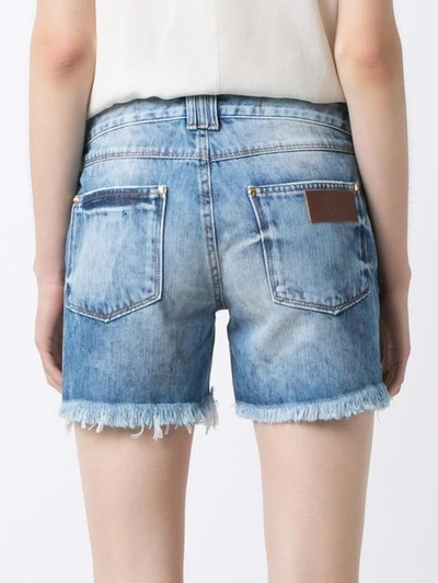 Shop Amapô Distressed Denim Shorts - Blue