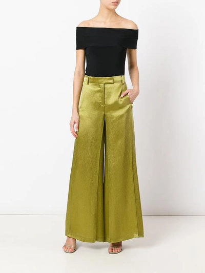 Shop Valentino Flared Trousers In Green